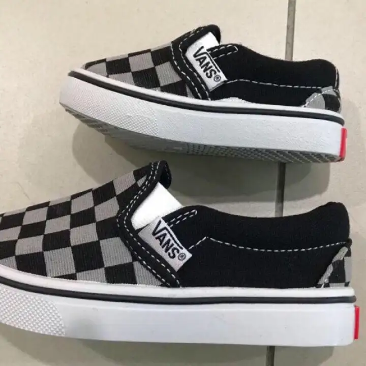kids slip on vans