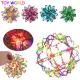 Large Colorful Expanding Ball Toy with lights Baby Throwing Ball Stretching Shrinking Beach Kick Ball Sphere Toy Sensory Toys Children Squishy Anti Stress fidget toy outdoor toys for kids. 